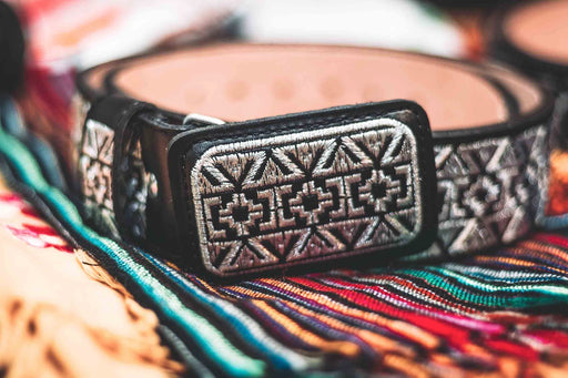 Leather belt with Aztec symbols